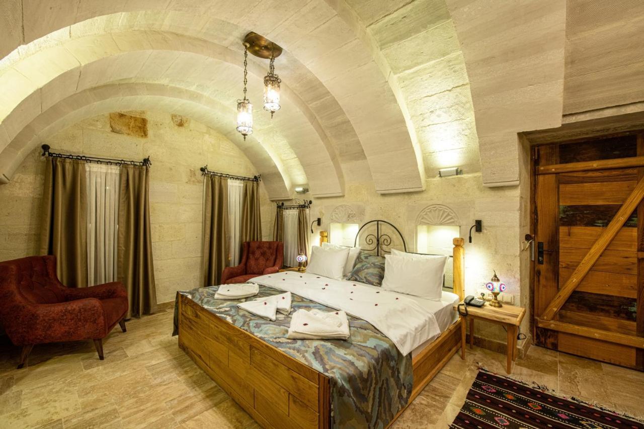 Charming Cave Hotel Гьореме Стая снимка