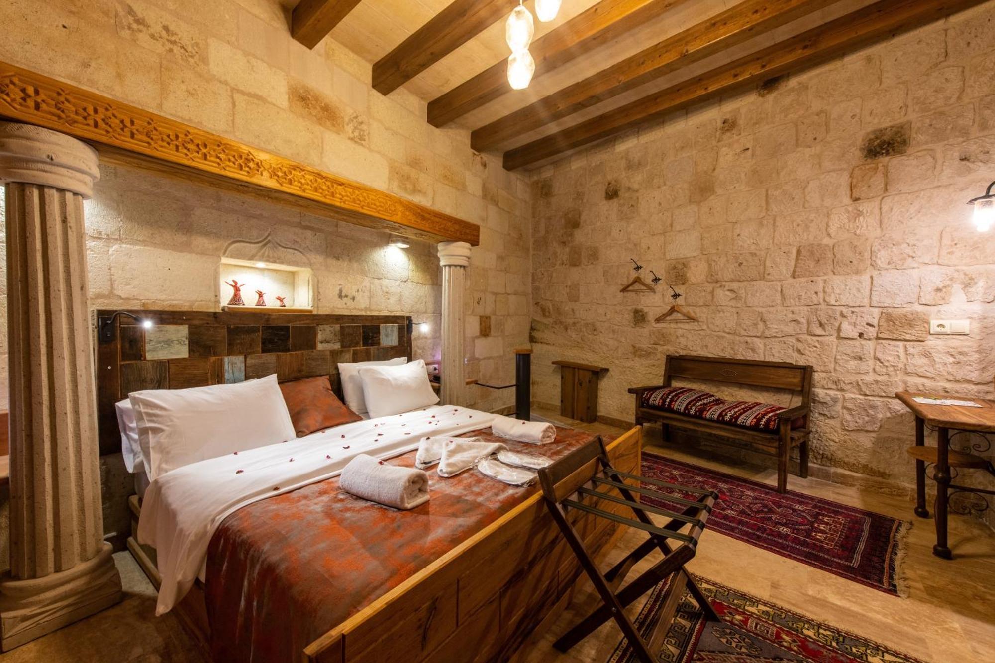Charming Cave Hotel Гьореме Стая снимка