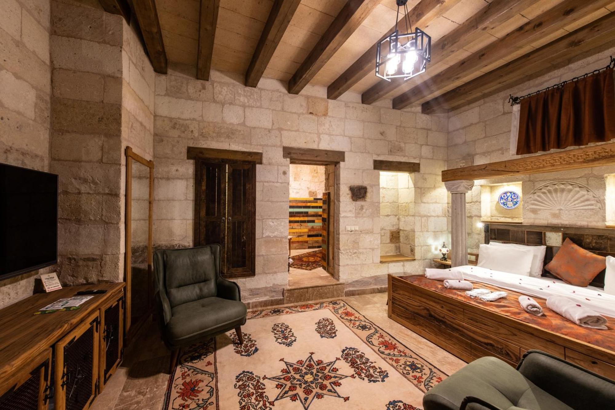 Charming Cave Hotel Гьореме Стая снимка