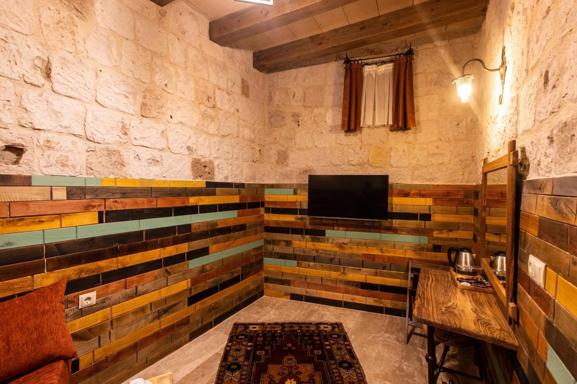 Charming Cave Hotel Гьореме Стая снимка