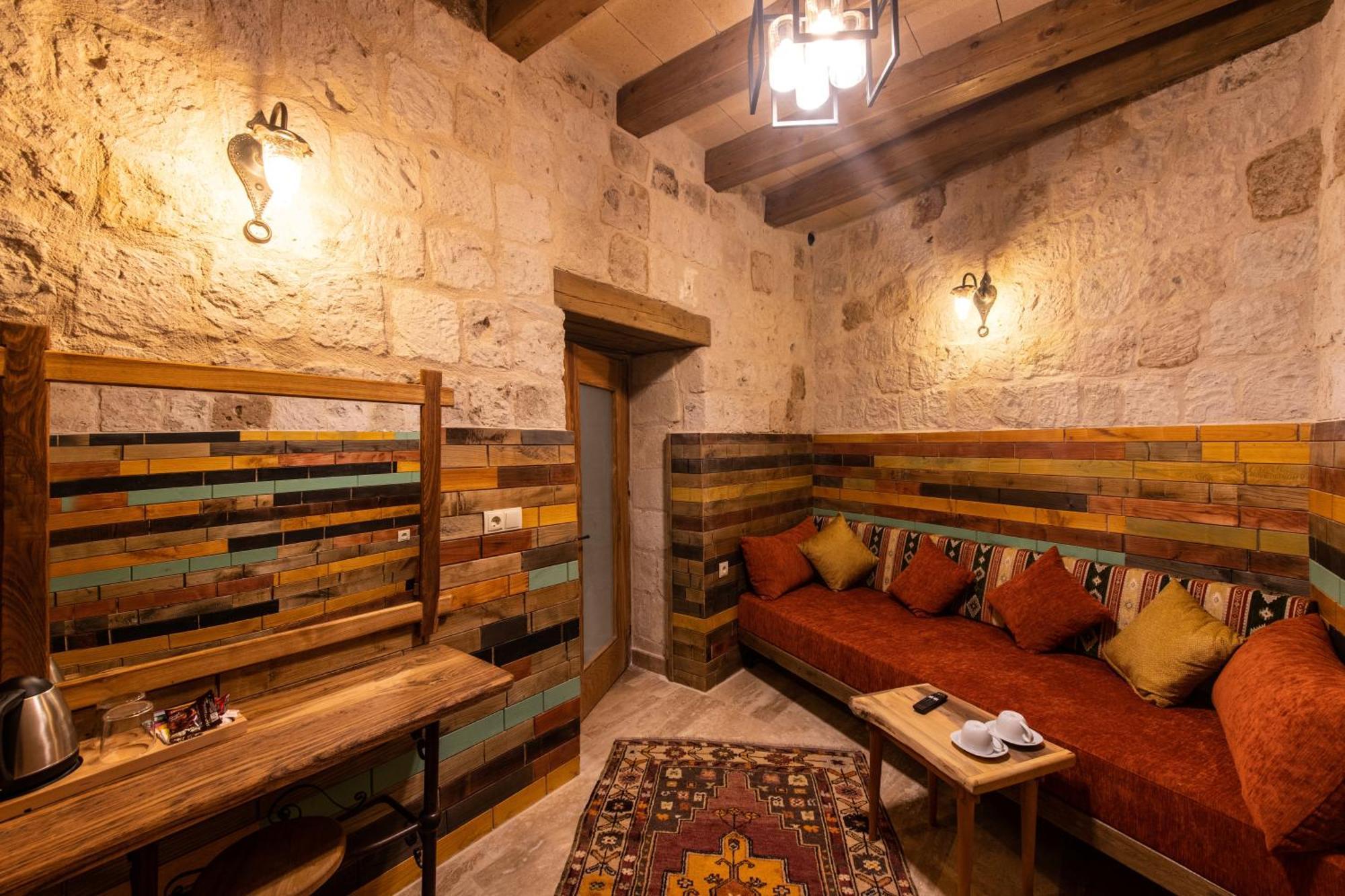 Charming Cave Hotel Гьореме Стая снимка