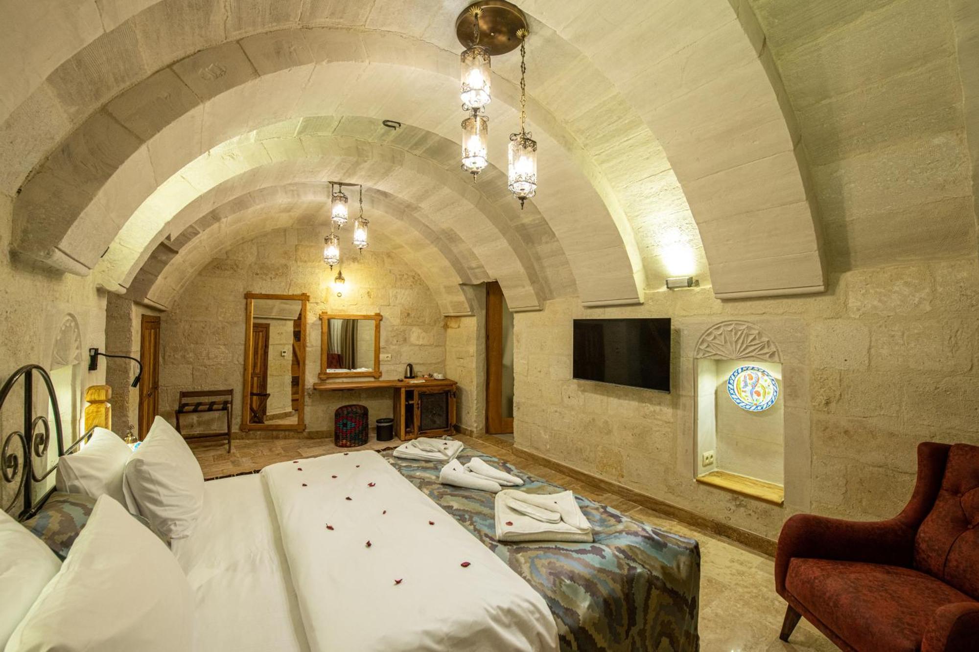 Charming Cave Hotel Гьореме Стая снимка