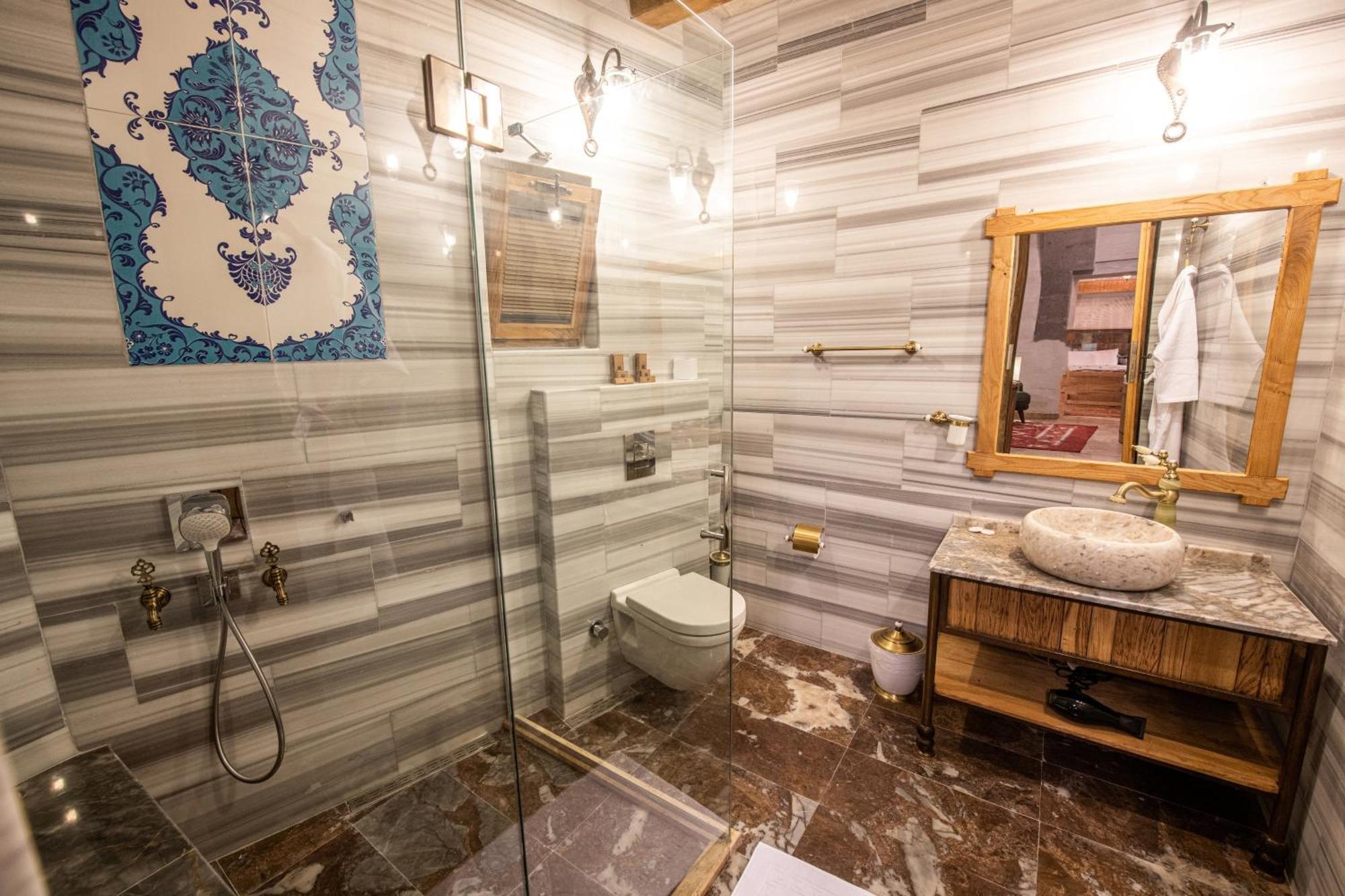 Charming Cave Hotel Гьореме Стая снимка