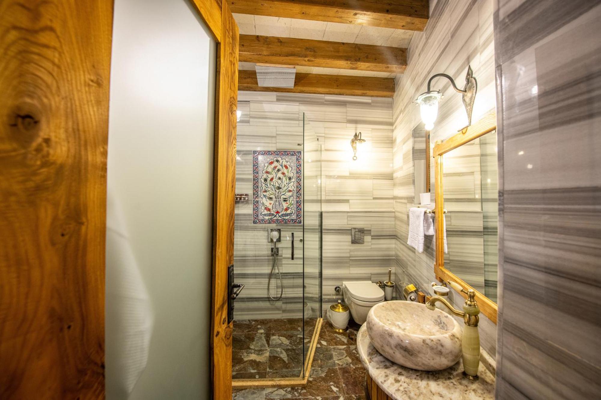 Charming Cave Hotel Гьореме Стая снимка