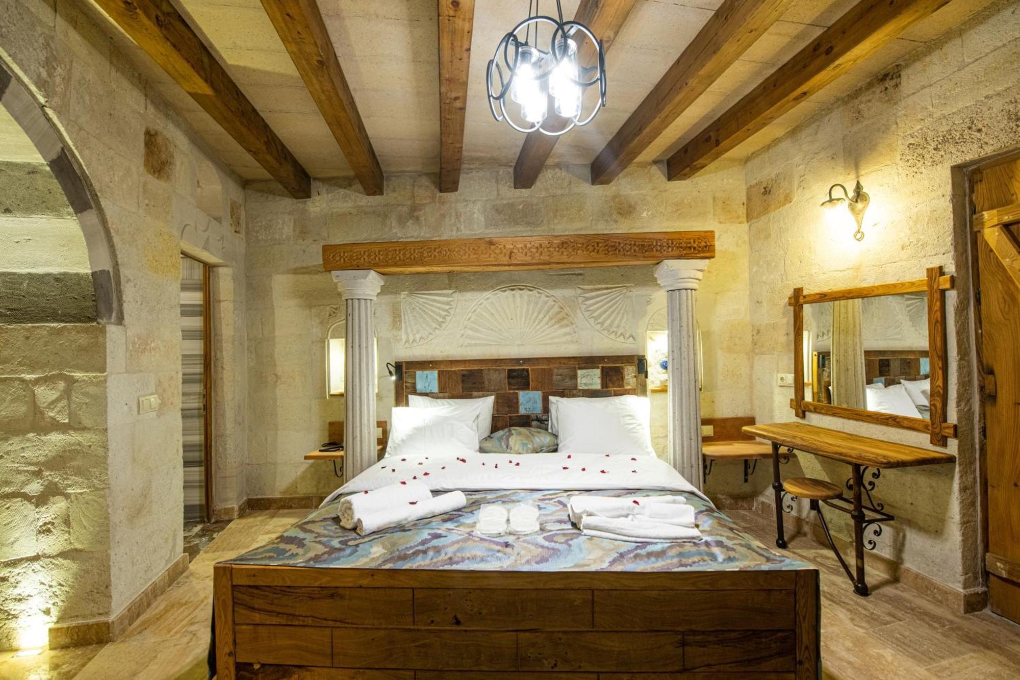 Charming Cave Hotel Гьореме Стая снимка